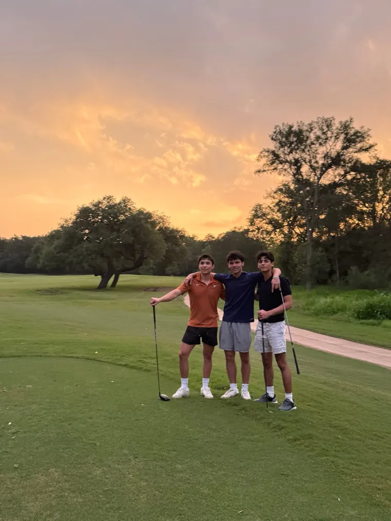 The Recall Systems team on the golf course at sunset